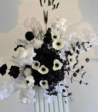 Load image into Gallery viewer, White arch backdrop, 2 x black & white flowers, 2 x white square ripple plinths - HIRE ONLY