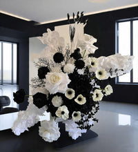 Load image into Gallery viewer, White arch backdrop, 2 x black & white flowers, 2 x black cylinder plinths - HIRE ONLY