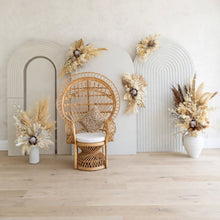 Load image into Gallery viewer, Three white backdrops / arches & 5 x boho flowers & Queen Peacock chair - HIRE ONLY