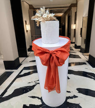 Load image into Gallery viewer, White cylinder plinth cake or flower stand - 90cm with bow - HIRE ONLY