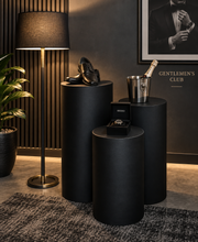 Load image into Gallery viewer, Set of 3 Black Cylinder Plinths – Grooms Preparation Room - HIRE ONLY