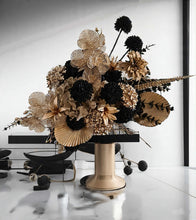 Load image into Gallery viewer, Black Hexagonal mesh backdrop and black & gold flowers - HIRE ONLY