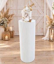 Load image into Gallery viewer, White cement look round ripple plinth - 90cm - HIRE ONLY