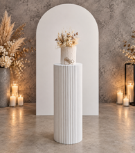 Load image into Gallery viewer, White cement look round ripple plinth - 90cm - HIRE ONLY