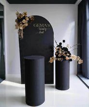 Load image into Gallery viewer, Black arch backdrop, 2 x black & gold flowers & 2 x black plinths - HIRE ONLY