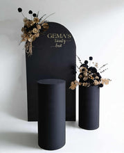 Load image into Gallery viewer, Black arch backdrop, 2 x black & gold flowers & 2 x black plinths - HIRE ONLY