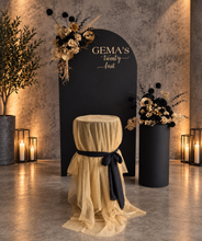 Load image into Gallery viewer, Black arch backdrop, 2 x black & gold flowers & 2 x black plinths - HIRE ONLY