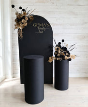 Load image into Gallery viewer, Black arch backdrop, 2 x black & gold flowers & 2 x black plinths - HIRE ONLY