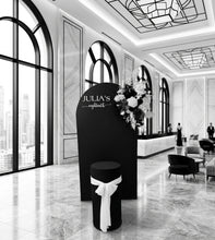 Load image into Gallery viewer, Black arch backdrop, Black & white flowers and black plinth / cake stand - HIRE ONLY