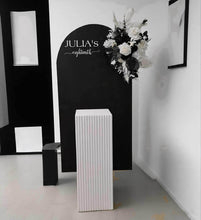 Load image into Gallery viewer, Black arch backdrop, Black & white flowers and white square ripple plinth / cake stand - HIRE ONLY
