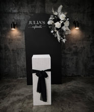 Load image into Gallery viewer, Black arch backdrop, Black & white flowers and white square ripple plinth / cake stand - HIRE ONLY