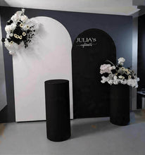 Load image into Gallery viewer, 2 x arch backdrop (black & white), 2 x black & white flowers, 2 x cylinder plinths - HIRE ONLY
