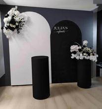 Load image into Gallery viewer, 2 x arch backdrop (black & white), 2 x black & white flowers, 2 x cylinder plinths - HIRE ONLY