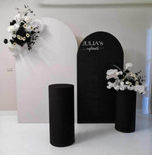 Load image into Gallery viewer, 2 x arch backdrop (black & white), 2 x black & white flowers, 2 x cylinder plinths - HIRE ONLY