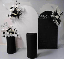 Load image into Gallery viewer, 2 x arch backdrop (black & white), 3 x black & white flowers, 2 x cylinder plinths - HIRE ONLY