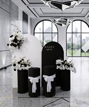 Load image into Gallery viewer, 2 x arch backdrop (black & white), 3 x black & white flowers, 2 x cylinder plinths - HIRE ONLY
