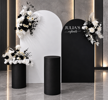 Load image into Gallery viewer, 2 x arch backdrop (black & white), 3 x black & white flowers, 2 x cylinder plinths - HIRE ONLY