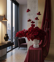 Load image into Gallery viewer, Burgundy floor / plinth flowers in white ribbed pot - HIRE OLY