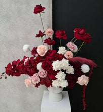 Load image into Gallery viewer, Burgundy, pink & white floor / plinth flowers in white ribbed pot - HIRE ONLY