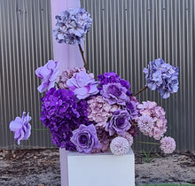 Load image into Gallery viewer, White wood arbour & 2 x purple / violet flowers - HIRE ONLY