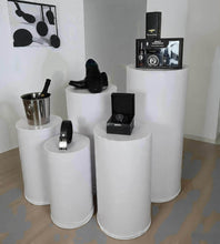 Load image into Gallery viewer, Grooms Preparation Room - Set of 5 White leather look Cylinder Plinths - HIRE ONLY
