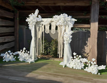 Load image into Gallery viewer, White wooden arbour & flowers w macrame - Deluxe - HIRE ONLY