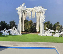 Load image into Gallery viewer, White wooden arbour & flowers w macrame - Deluxe - HIRE ONLY