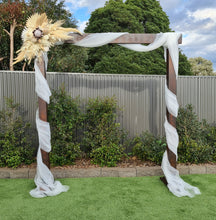 Load image into Gallery viewer, Rustic Wooden Arbour arch with boho flowers - HIRE ONLY
