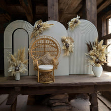 Load image into Gallery viewer, Three white backdrops / arches &amp; 5 x boho flowers &amp; Queen Peacock chair - HIRE ONLY
