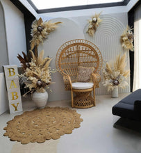 Load image into Gallery viewer, Two white backdrops / arches &amp; 5 x boho flowers &amp; Queen Peacock chair - HIRE ONLY
