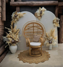 Load image into Gallery viewer, Two white backdrops / arches &amp; 5 x boho flowers &amp; Queen Peacock chair - HIRE ONLY
