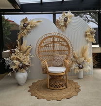 Load image into Gallery viewer, Two white backdrops / arches &amp; 5 x boho flowers &amp; Queen Peacock chair - HIRE ONLY

