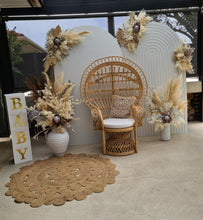Load image into Gallery viewer, Two white backdrops / arches &amp; 5 x boho flowers &amp; Queen Peacock chair - HIRE ONLY
