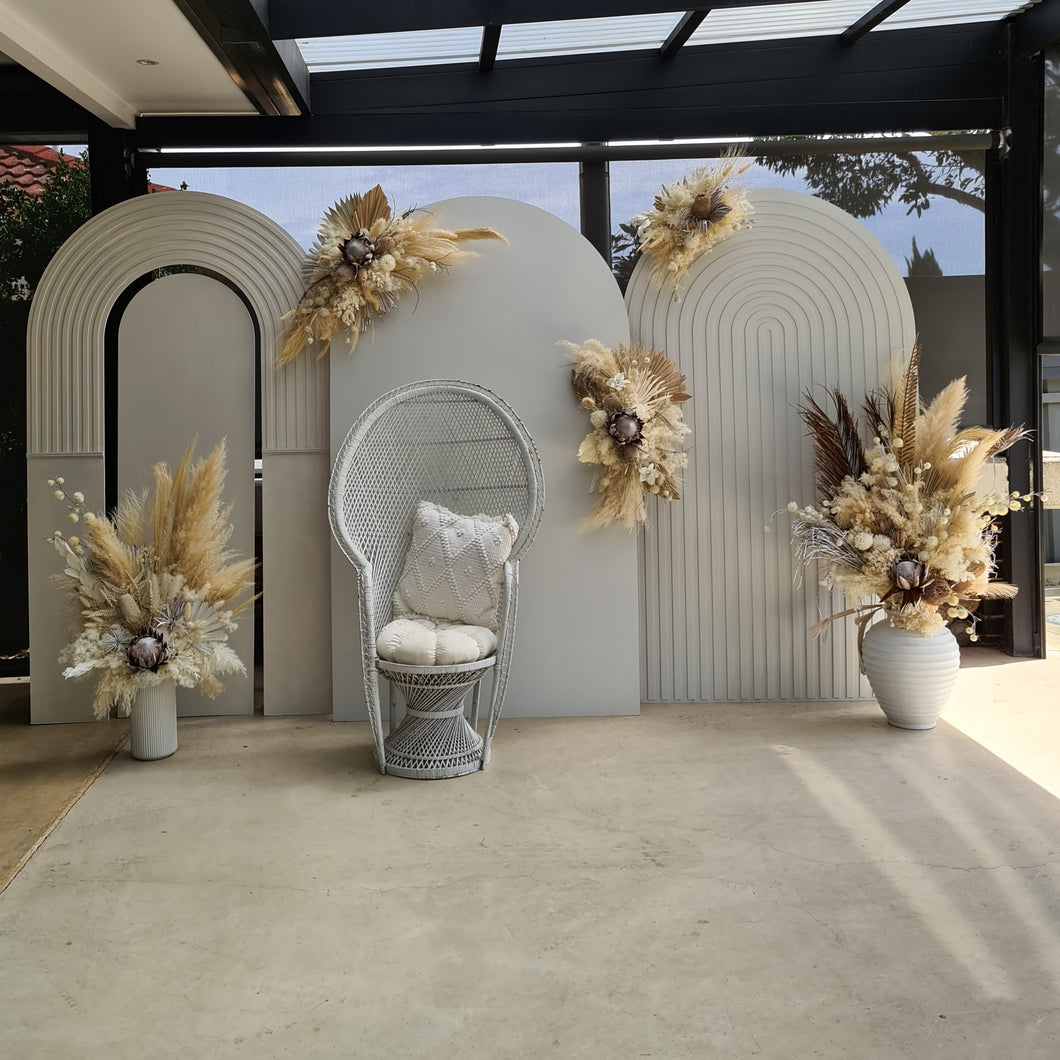 Two white backdrops / arches & 5 x boho flowers & White peacock chair - HIRE ONLY
