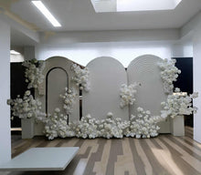 Load image into Gallery viewer, Three white backdrops / arches &amp; 11 x White flowers - Deluxe Package - HIRE ONLY
