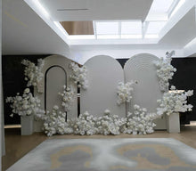 Load image into Gallery viewer, Three white backdrops / arches &amp; 11 x White flowers - Deluxe Package - HIRE ONLY
