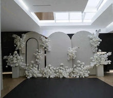 Load image into Gallery viewer, Three white backdrops / arches &amp; 11 x White flowers - Deluxe Package - HIRE ONLY
