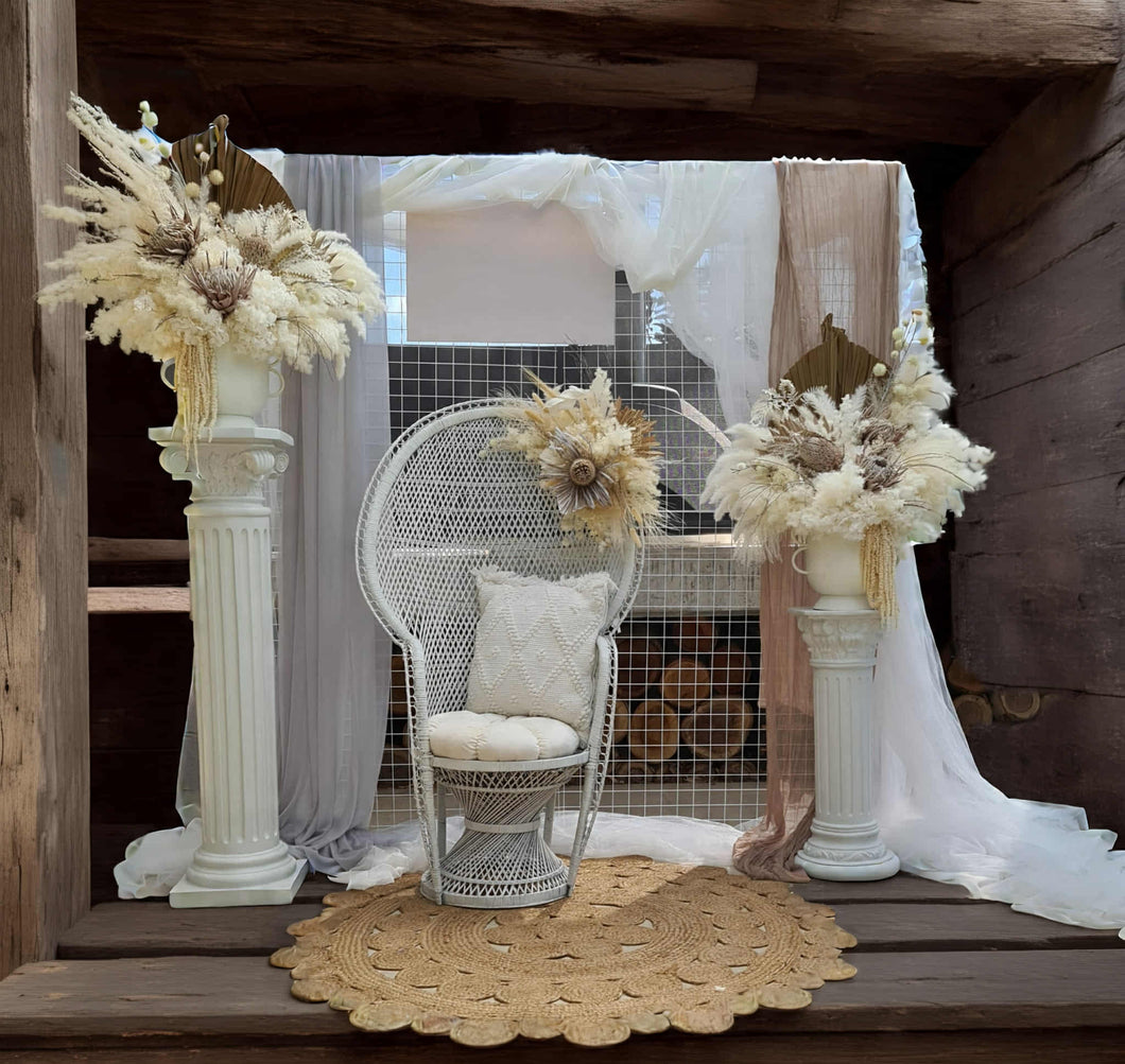 Boho urns & white mesh Roman columns & white peacock chair - HIRE ONLY
