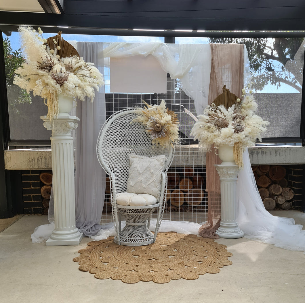 Boho urns & white mesh Roman columns & white peacock chair - HIRE ONLY