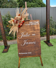 Load image into Gallery viewer, Rustic wooden easel with rustic small flowers - Welcome sign - HIRE ONLY

