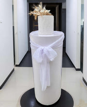 Load image into Gallery viewer, White cylinder plinth cake or flower stand - 90cm with bow - HIRE ONLY
