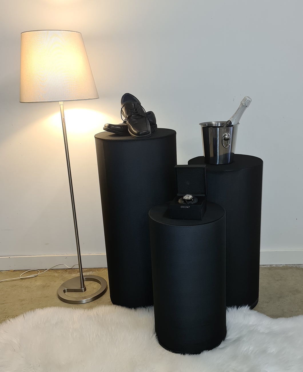 Set of 3 Black Cylinder Plinths – Grooms Preparation Room - HIRE ONLY
