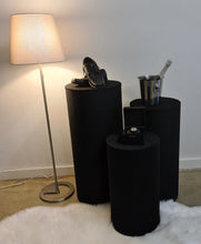 Load image into Gallery viewer, Set of 3 Black Cylinder Plinths – Grooms Preparation Room - HIRE ONLY
