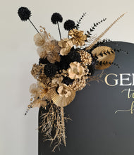 Load image into Gallery viewer, Black arch backdrop &amp; 2 x black &amp; gold flowers - HIRE ONLY
