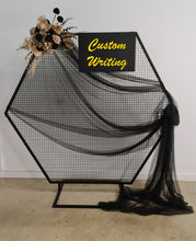 Load image into Gallery viewer, Black Hexagonal mesh backdrop and black &amp; gold flowers - HIRE ONLY
