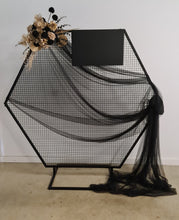 Load image into Gallery viewer, Black Hexagonal mesh backdrop and black &amp; gold flowers - HIRE ONLY
