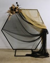 Load image into Gallery viewer, Black Hexagonal mesh backdrop and black &amp; gold flowers - HIRE ONLY
