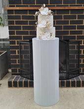 Load image into Gallery viewer, White cylinder ripple plinth cake or flower stand - 75cm - HIRE ONLY
