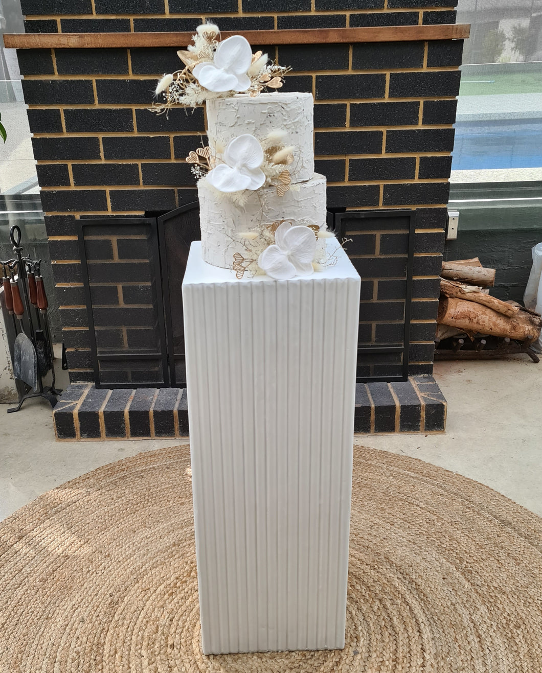 White cement look square ripple plinth cake / flower stand – 90cm - HIRE ONLY
