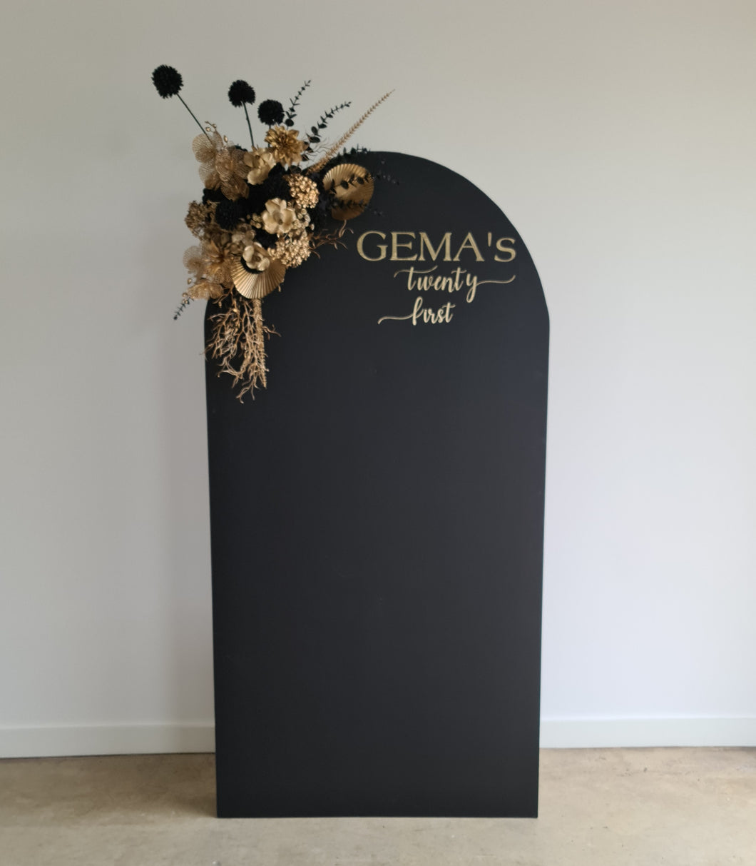 Black arch backdrop and black & gold flowers - HIRE ONLY